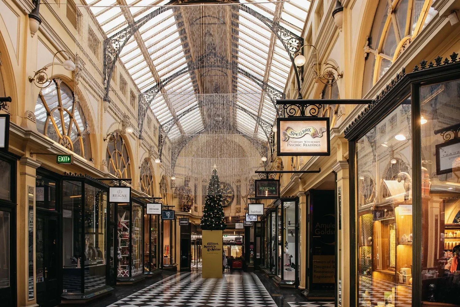 Spellbox within the long perspective of a Melbourne arcade.
