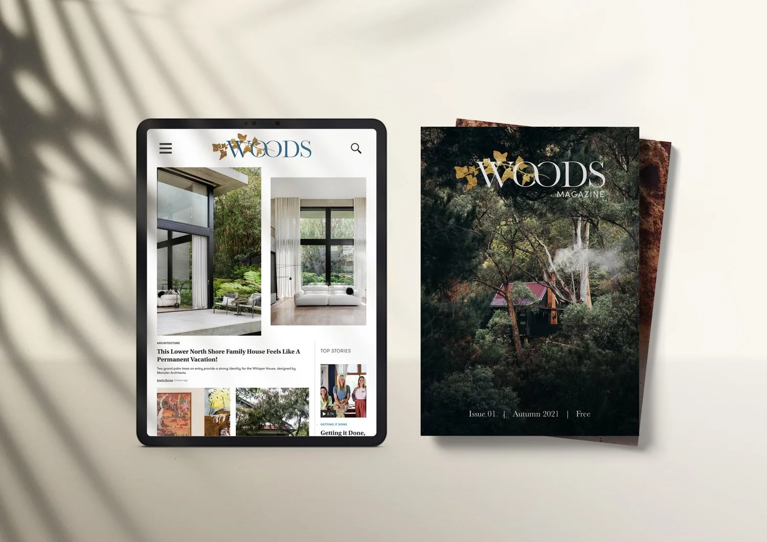 A Woods publication beside the website on a tablet.